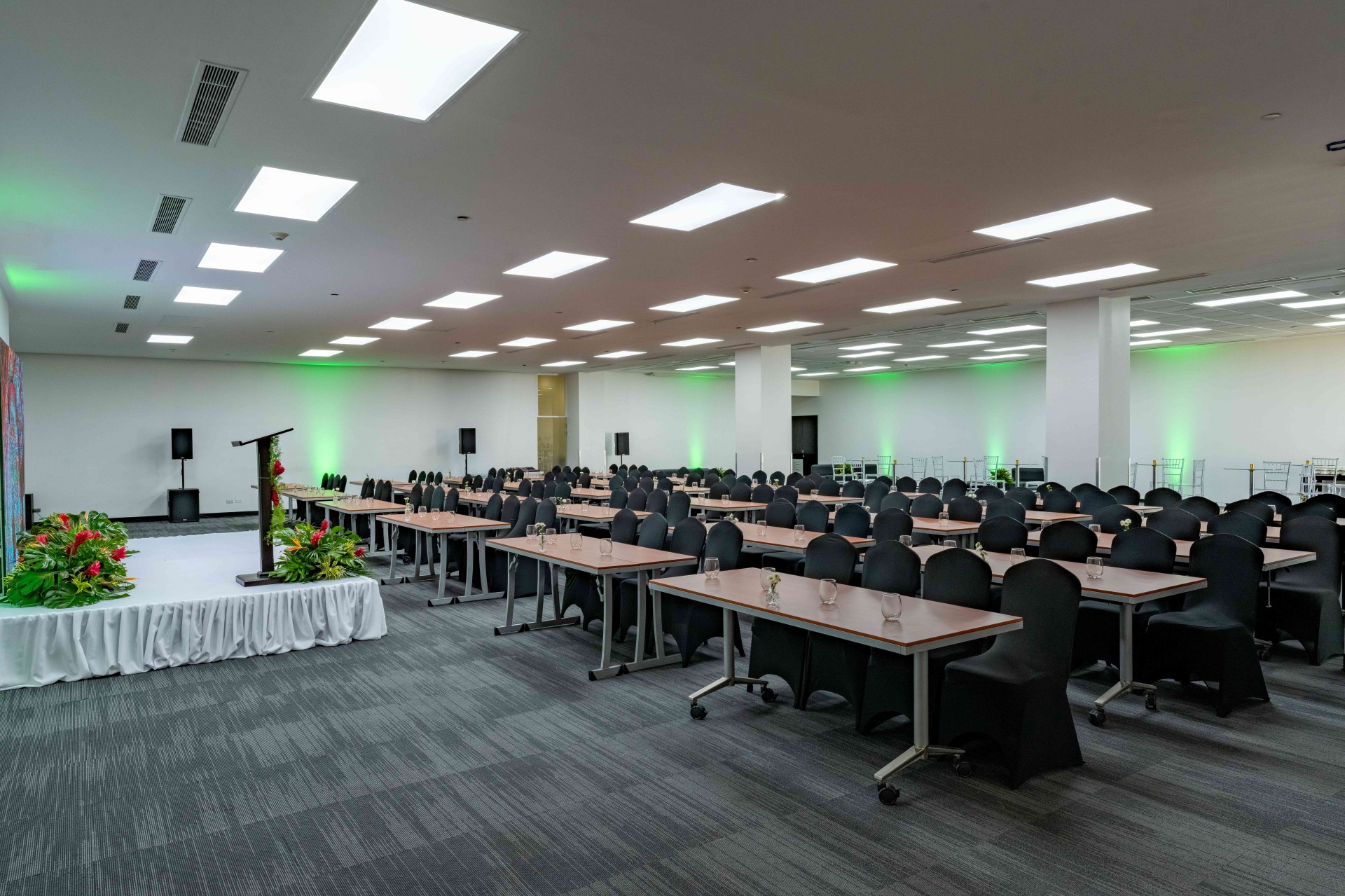 a room with tables and chairs