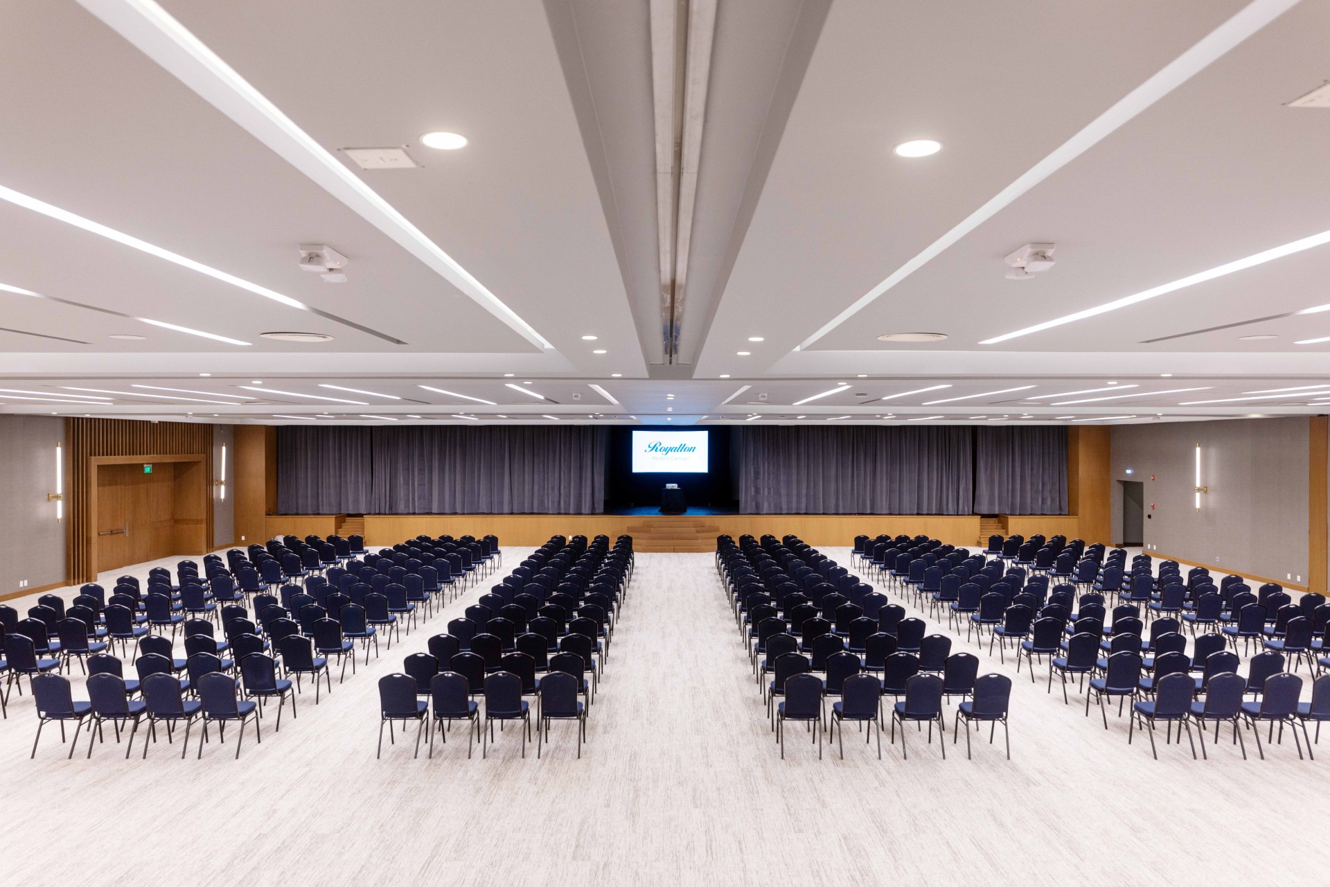 a large room with rows of chairs