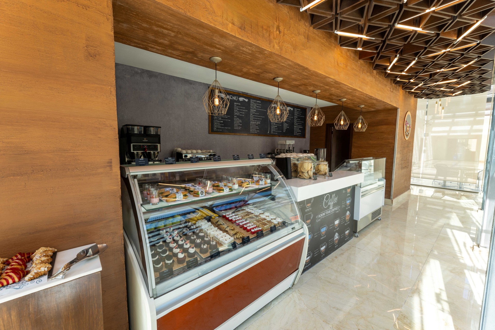 a display case in a coffee shop