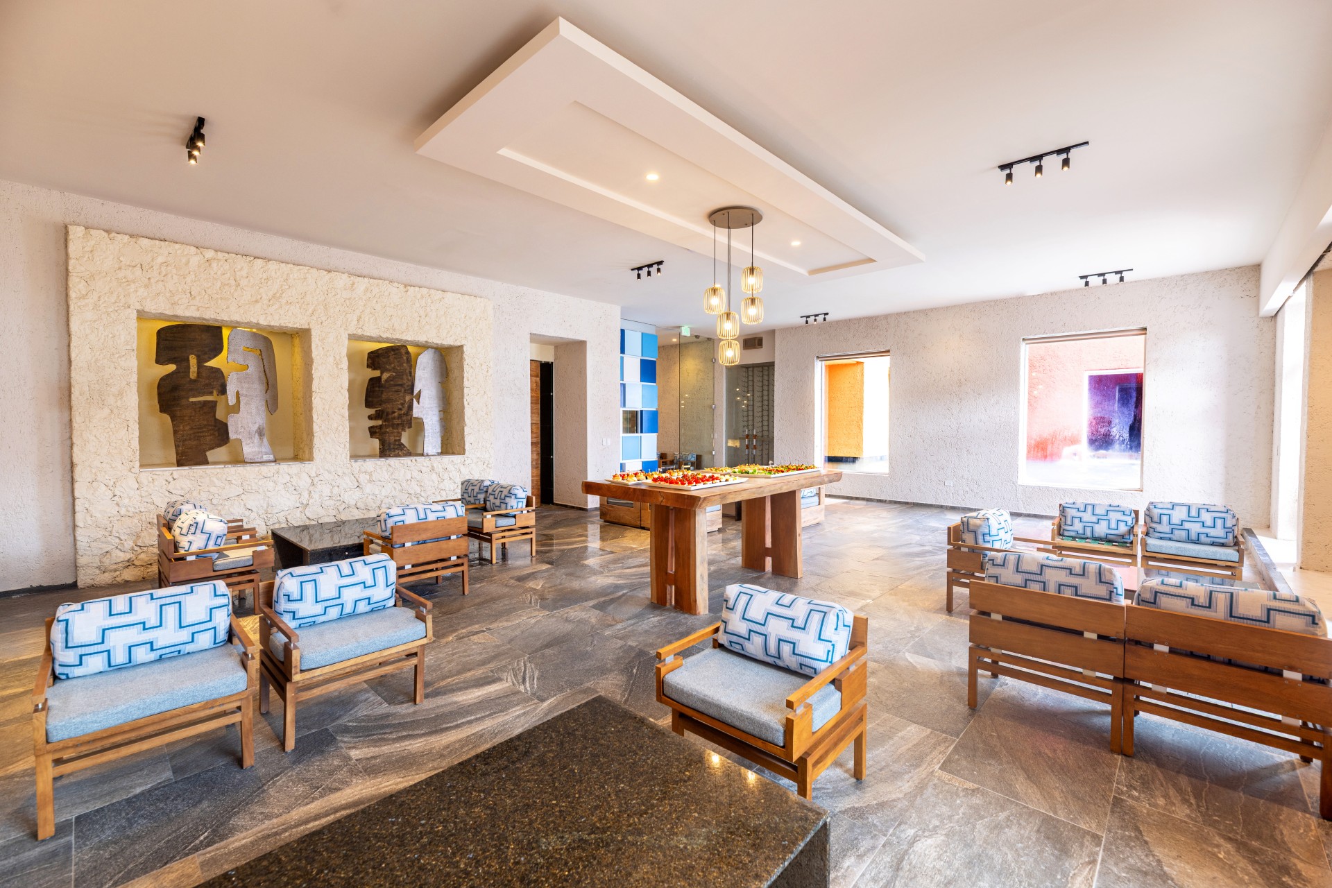 a room with chairs and a table