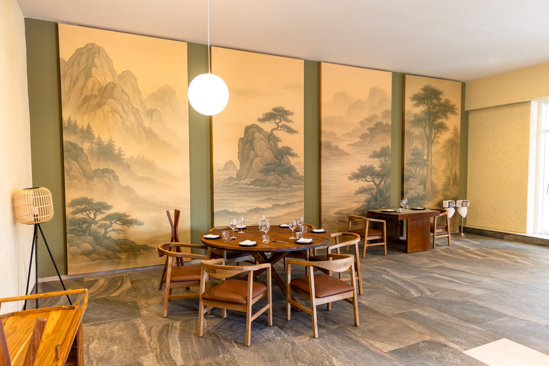 a room with a table and chairs