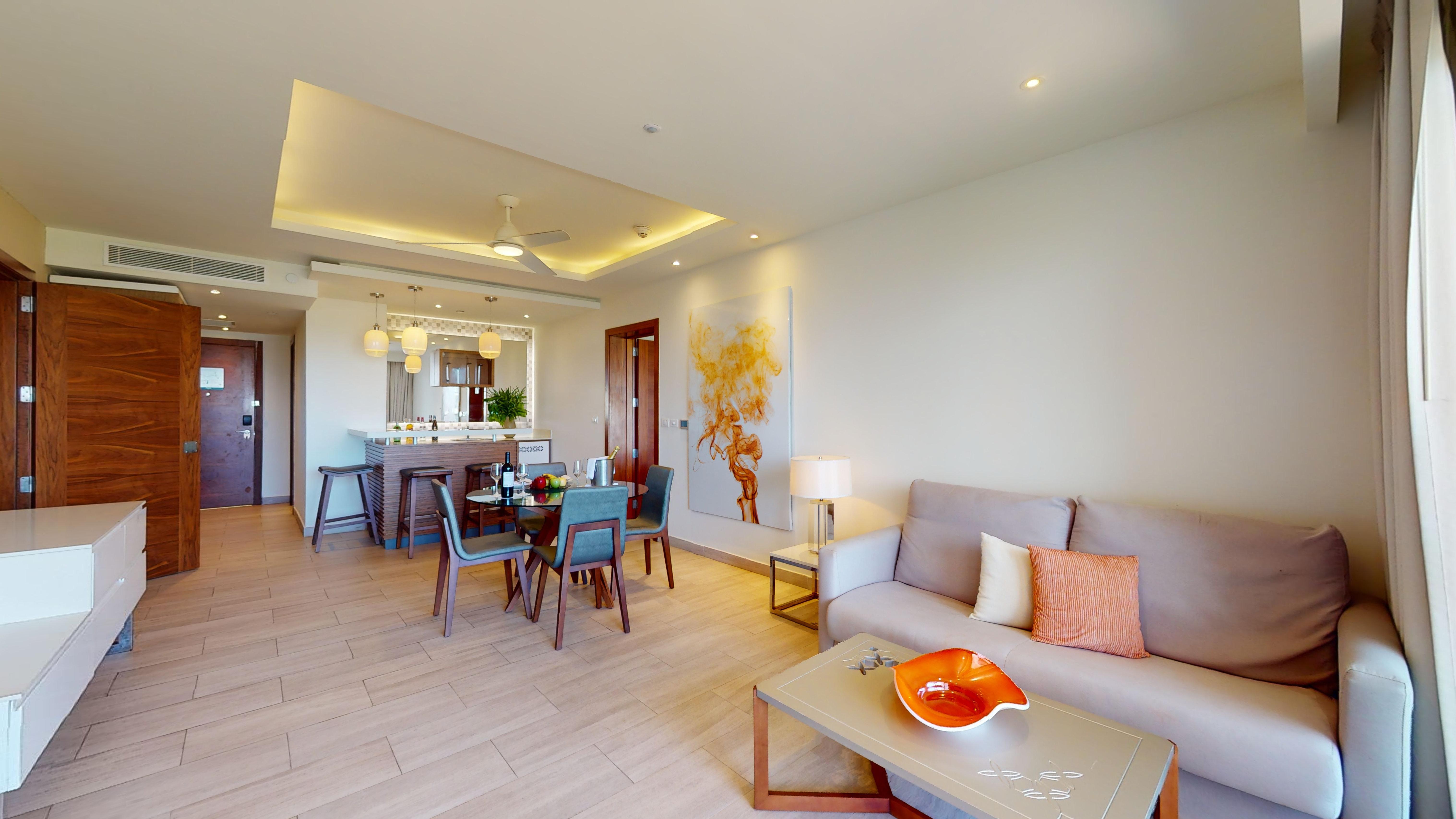 a living room with a couch and table