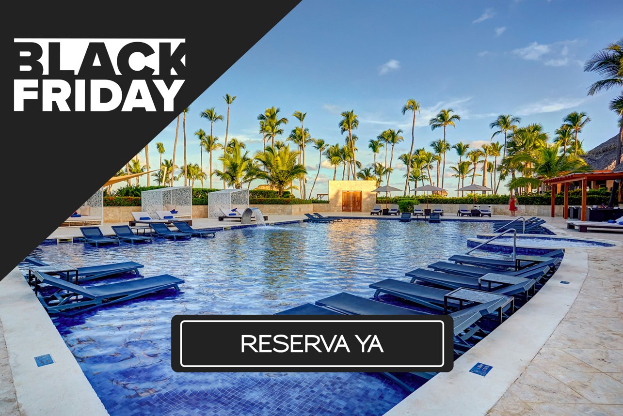 a pool with lounge chairs and palm trees