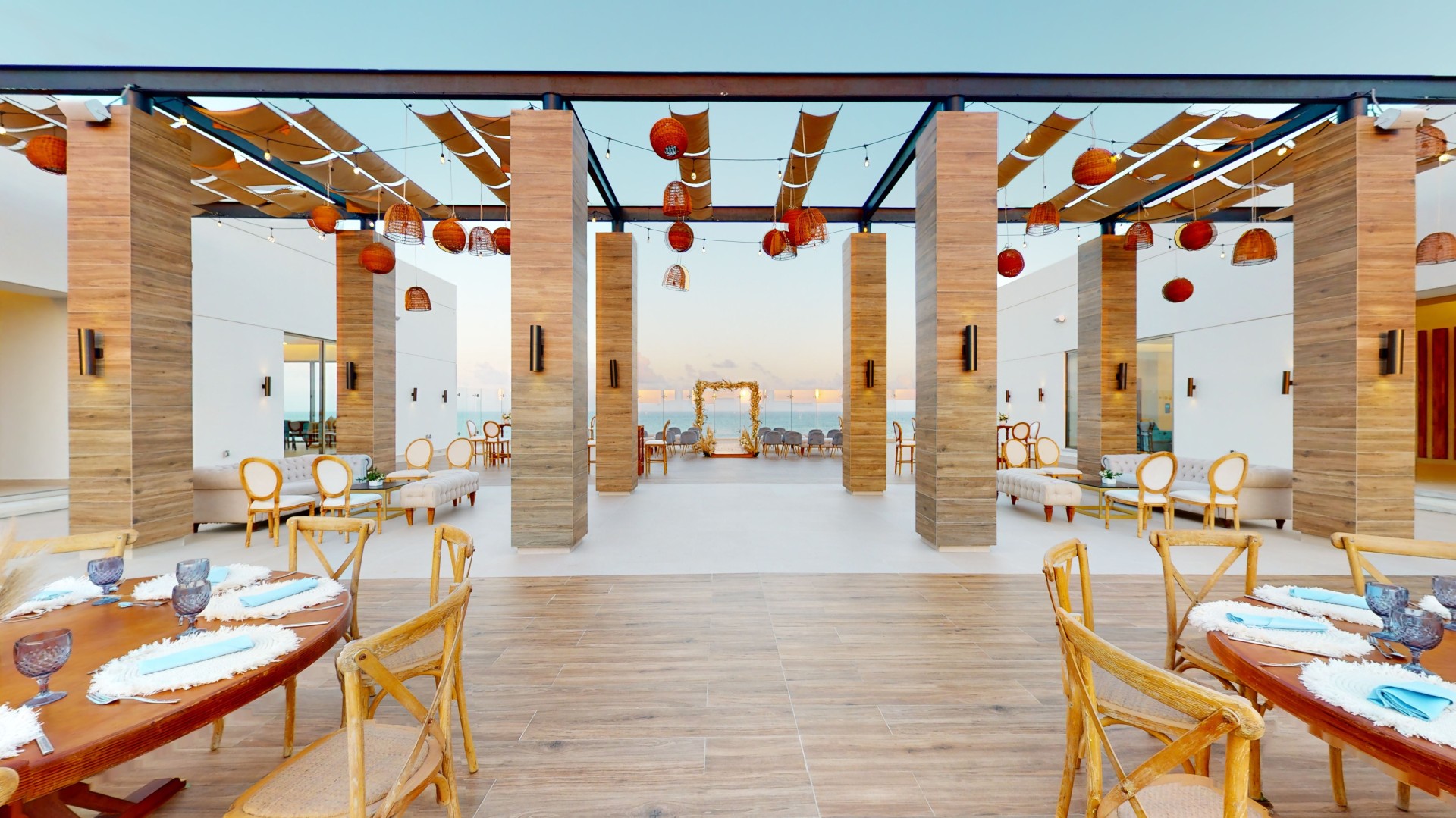 a patio with chairs and tables