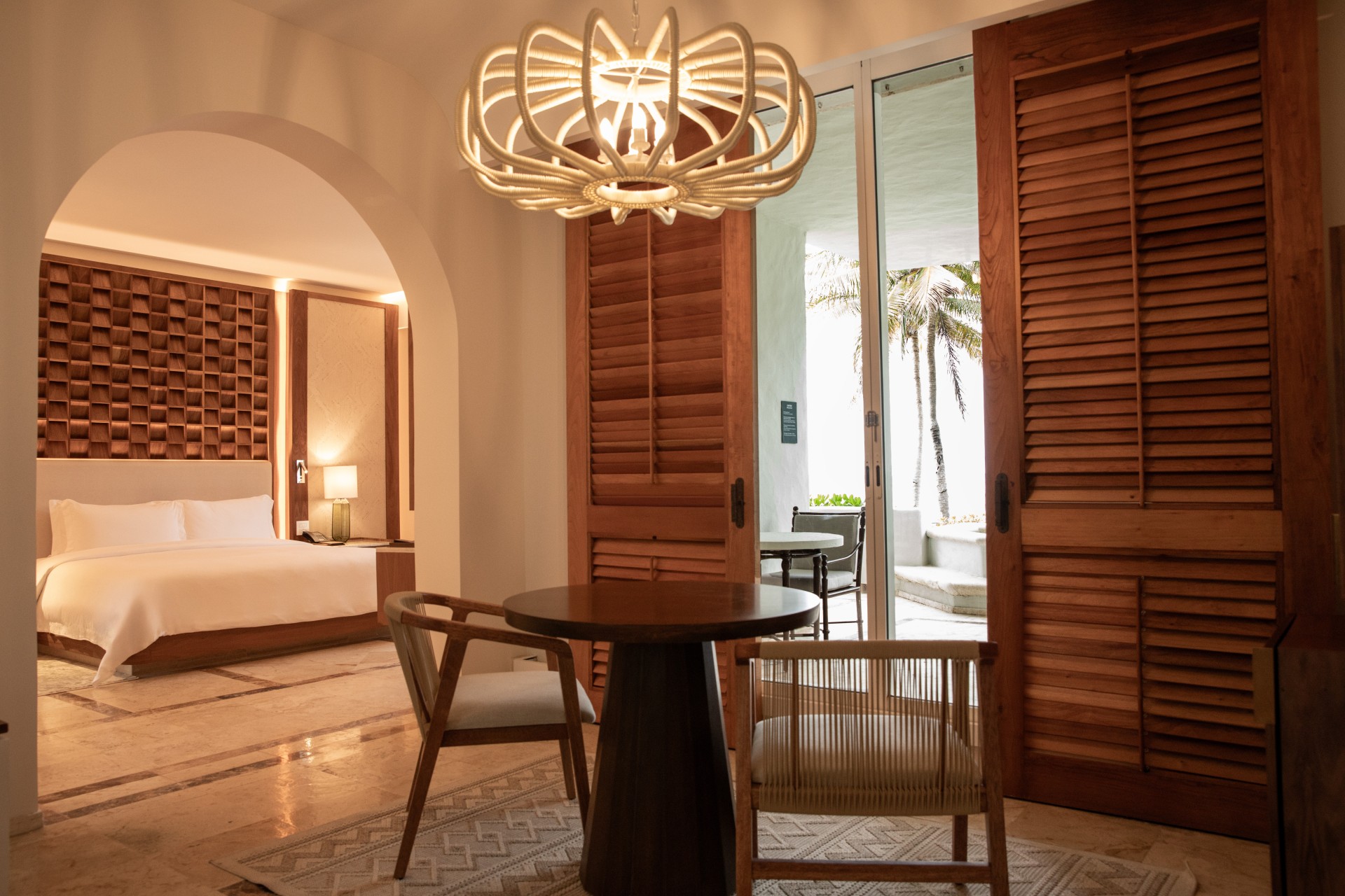 a room with a table and chairs