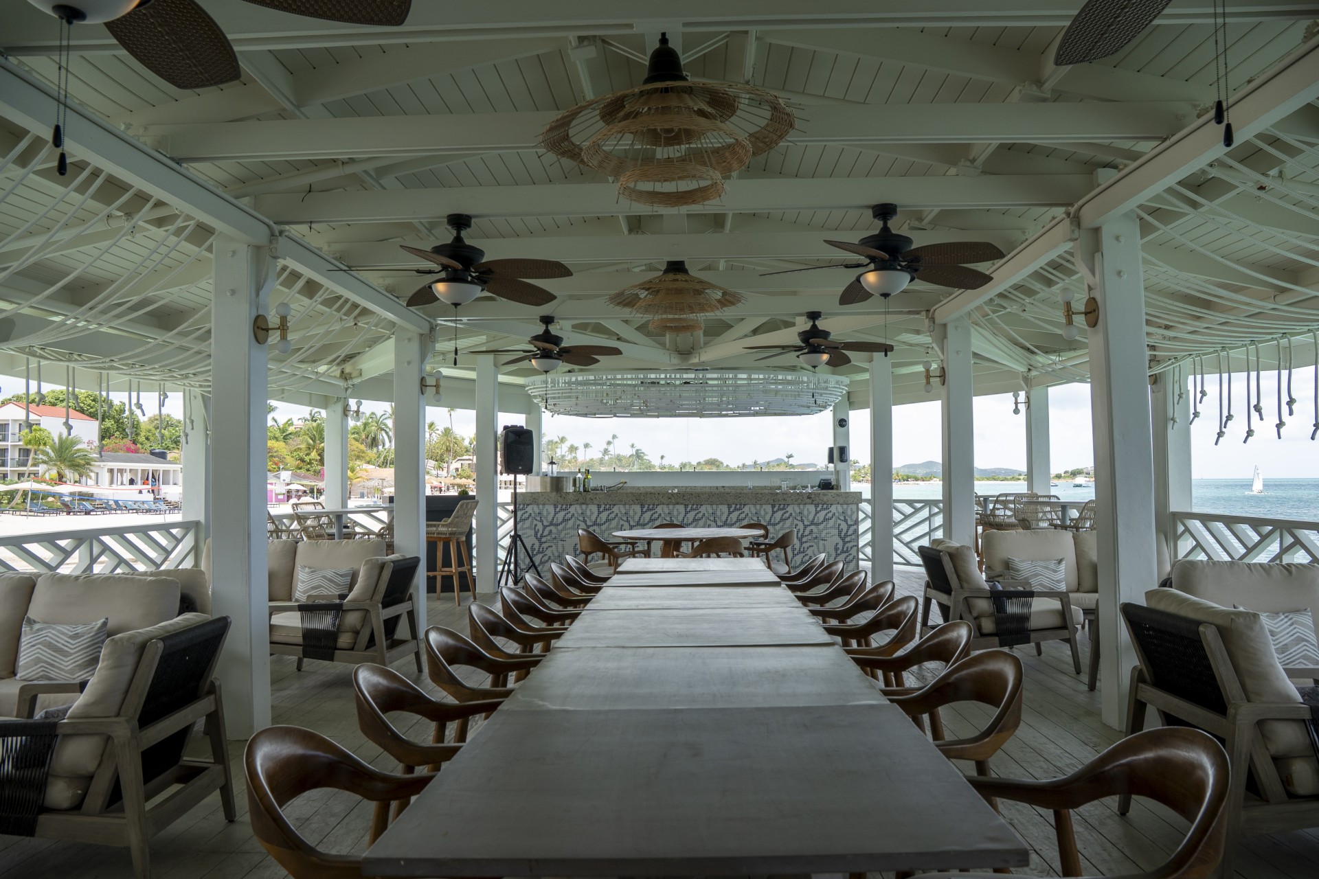 a large table and chairs inside a room