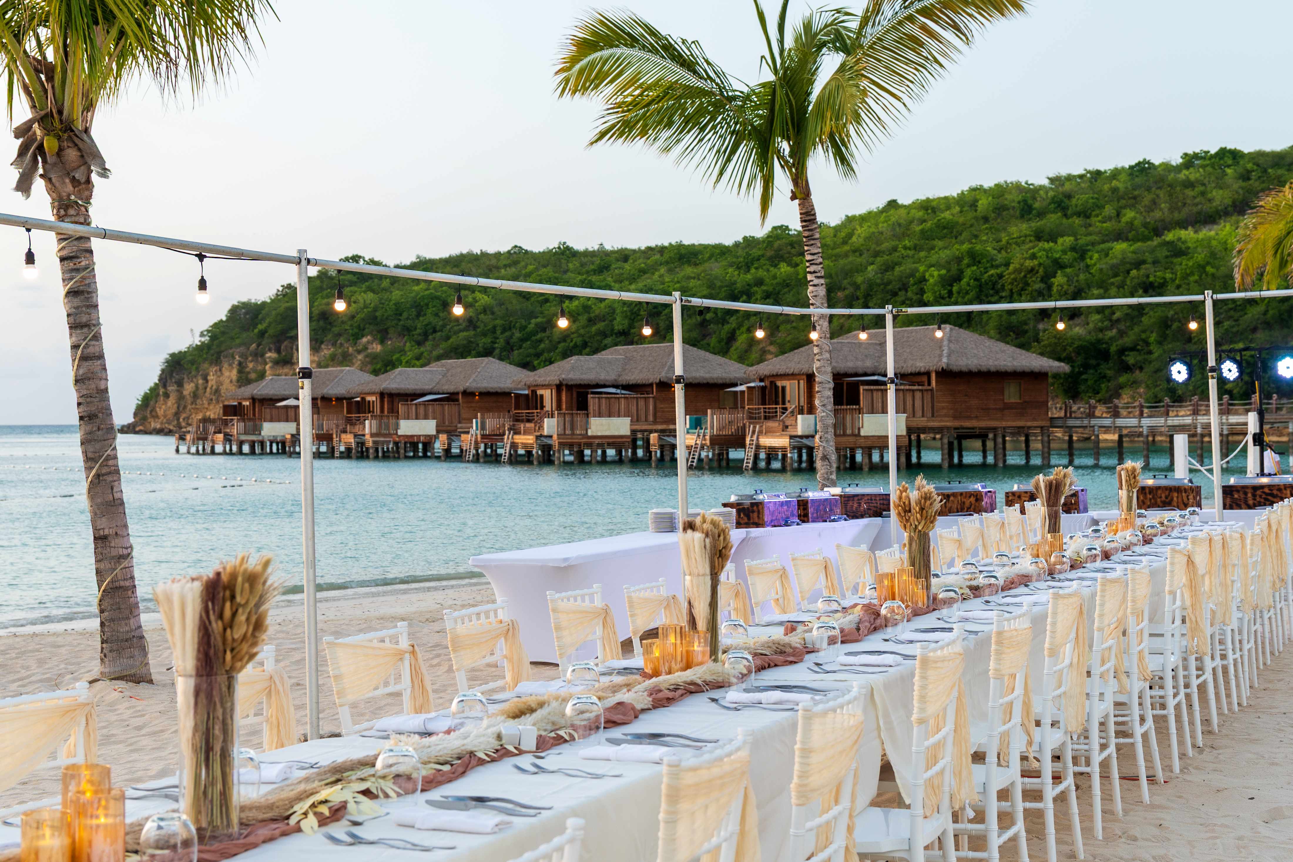 a long table set for a wedding reception