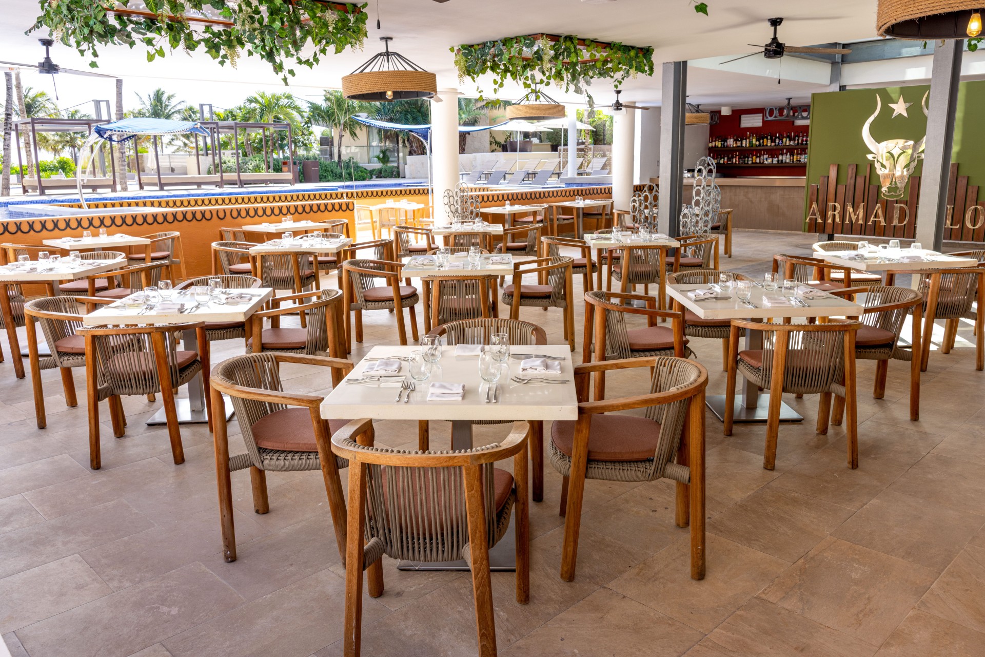 a restaurant with tables and chairs