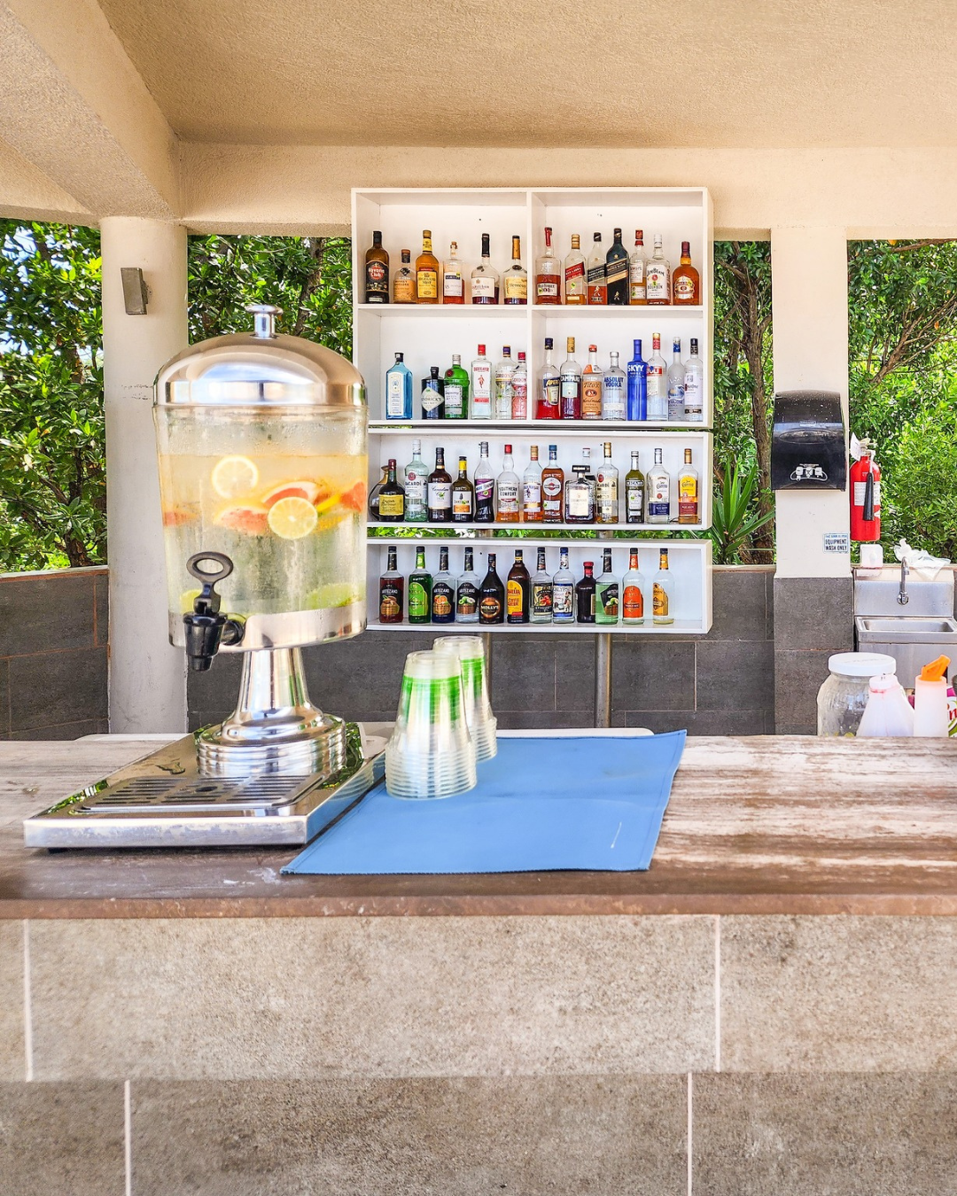 a drink dispenser on a counter