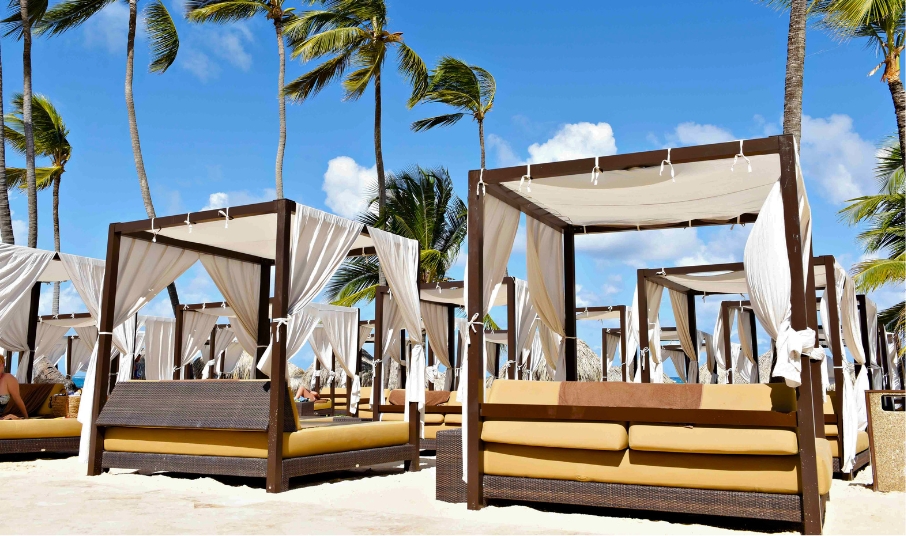 a group of beds on a beach