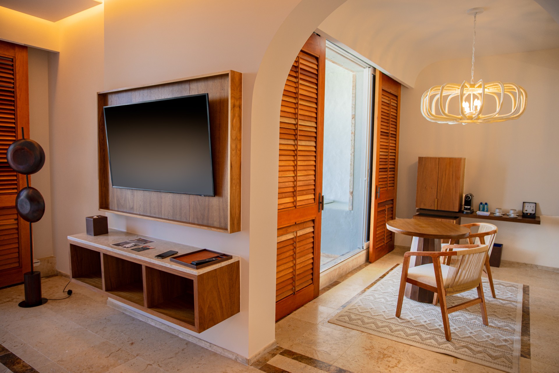 a room with a tv and a table