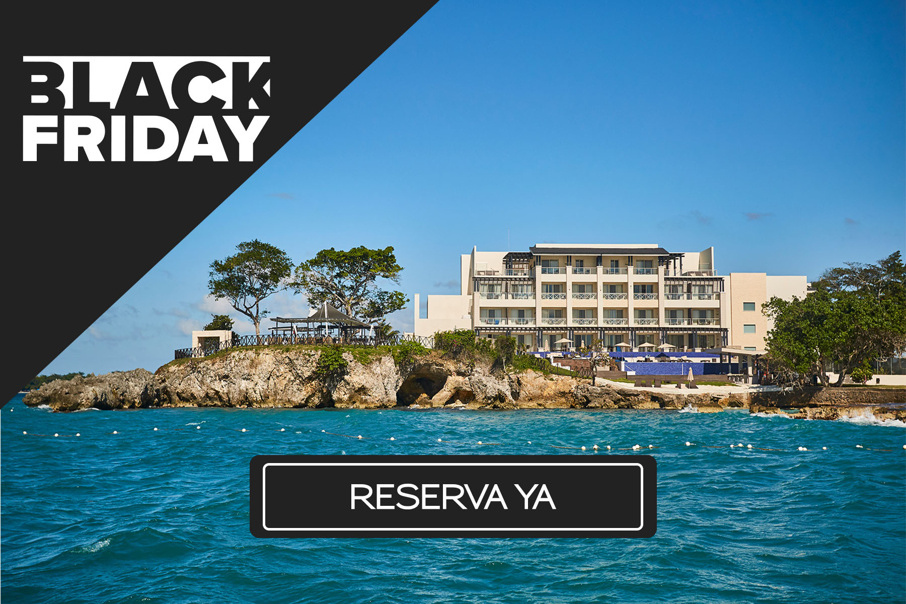 a building on a rocky island in the ocean
