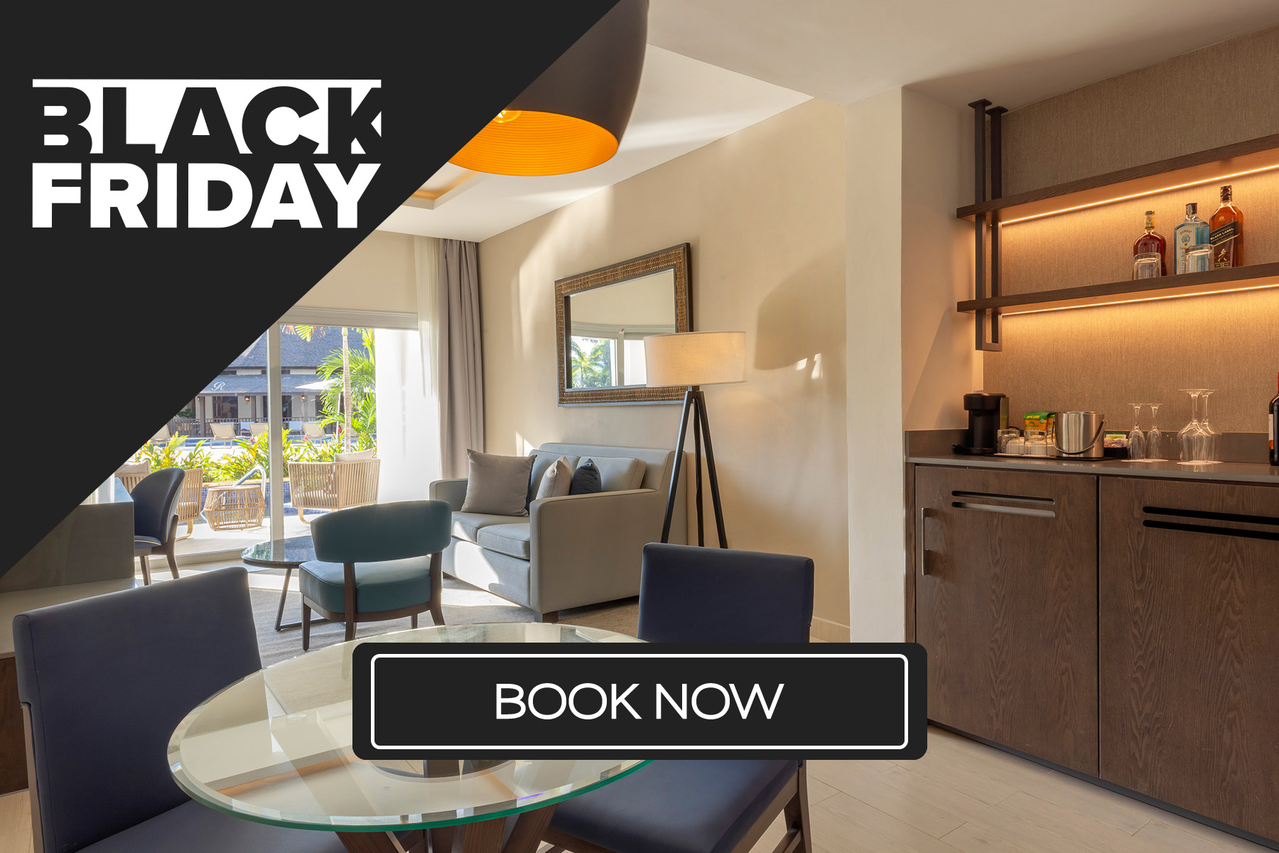 a room with a glass table and chairs