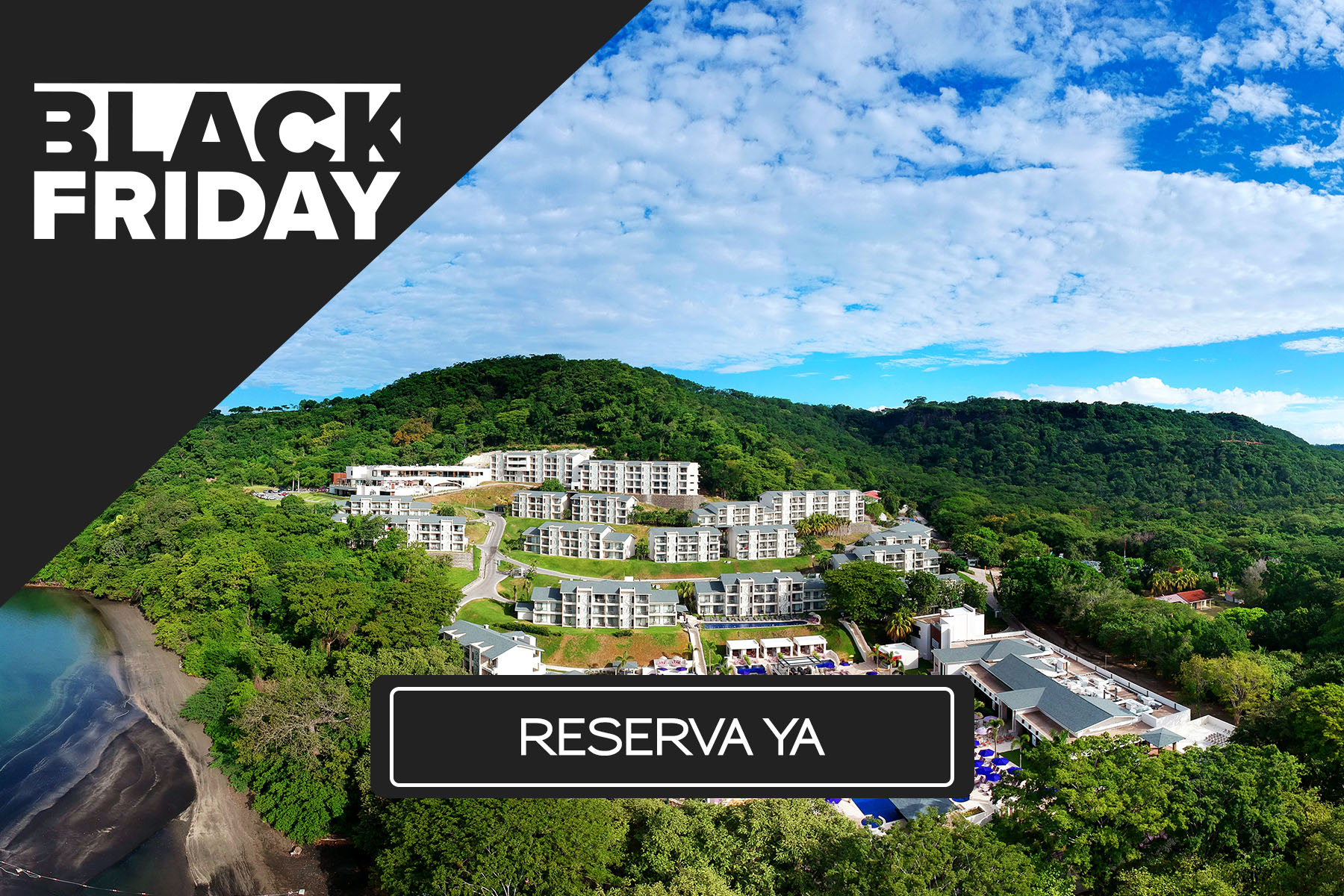a group of buildings in a forest