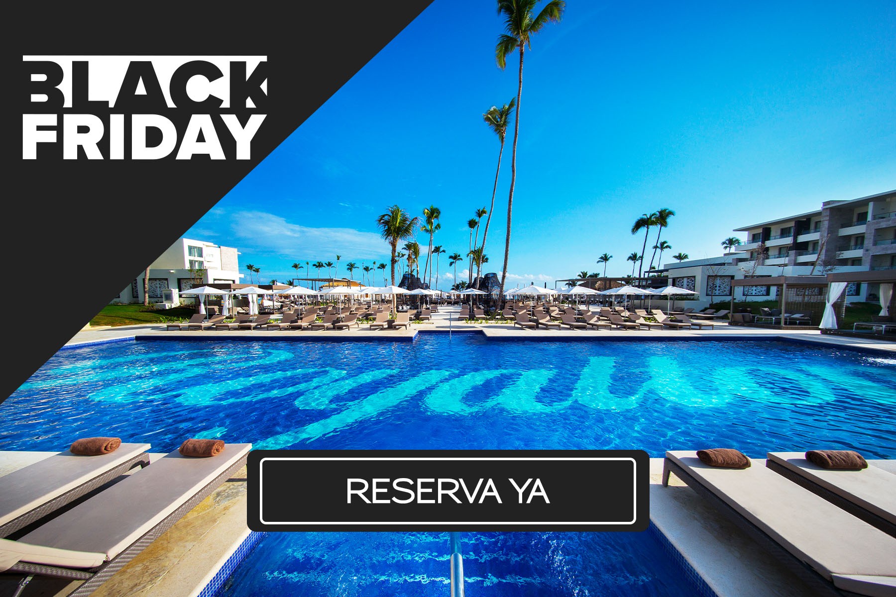 a pool with chairs and umbrellas in front of a resort