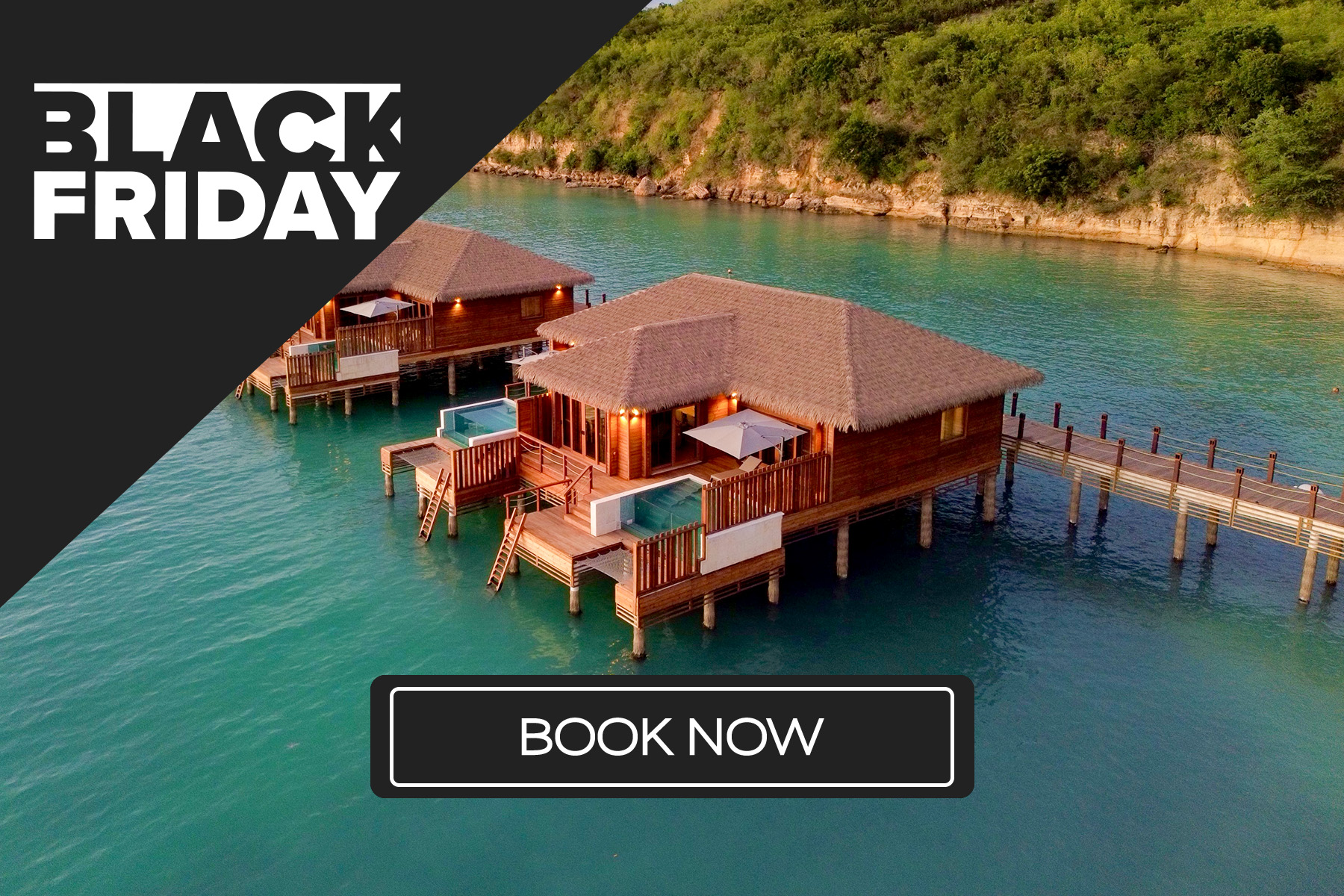 a group of houses on stilts in water