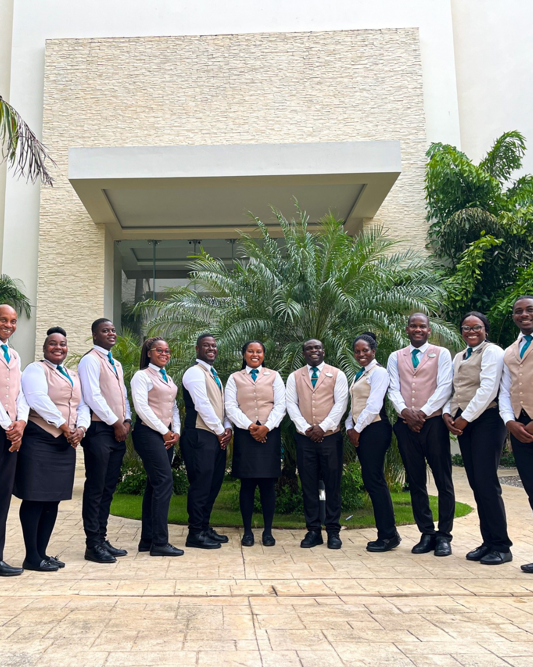 a group of people standing in front of a building