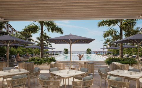 a pool with tables and chairs and umbrellas