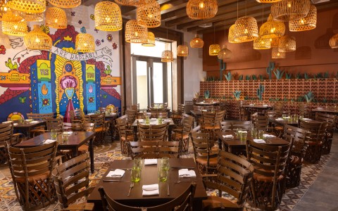 a room with tables and chairs