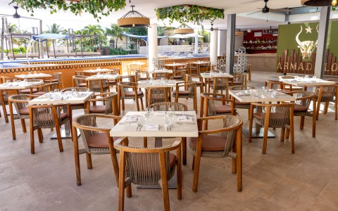 a restaurant with tables and chairs