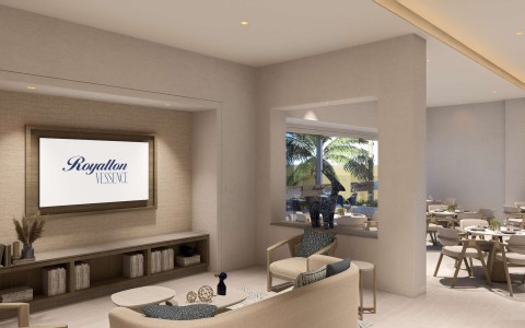 a room with a tv and a couch