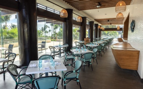 a restaurant with tables and chairs