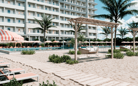 a pool with a large building in the background
