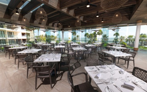 a restaurant with tables and chairs