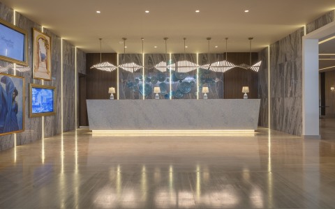 a reception desk in a hotel