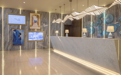 a reception desk in a hotel