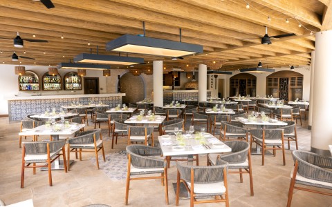 a large room with tables and chairs