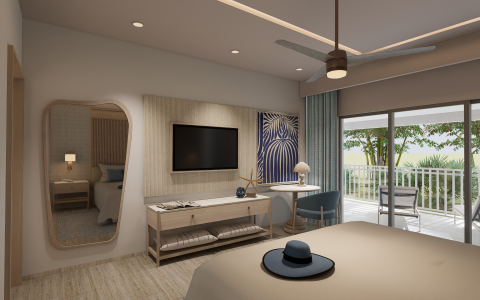 a room with a bed and a table and a tv