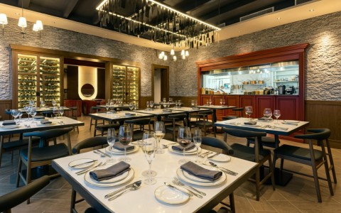 a restaurant with tables and chairs