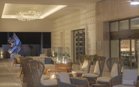a room with chairs and tables