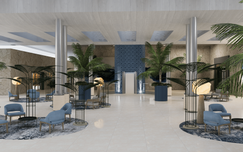 a lobby with palm trees and chairs