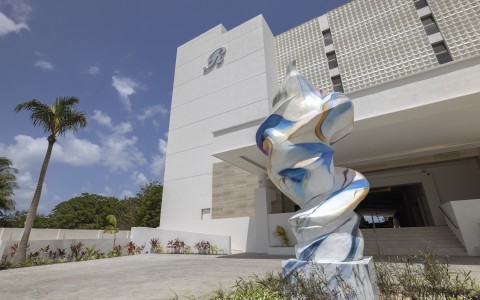 a sculpture outside of a building