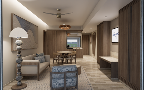 a living room with a table and chairs