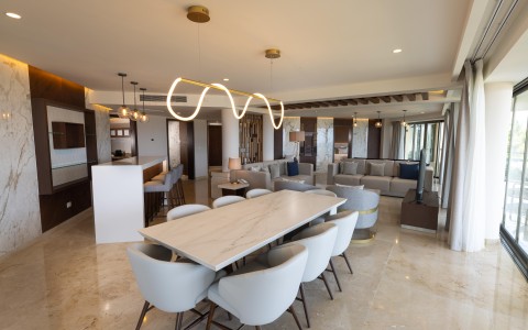 a room with a table and chairs