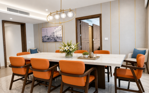 a dining table with orange chairs