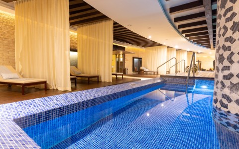 a swimming pool inside a room