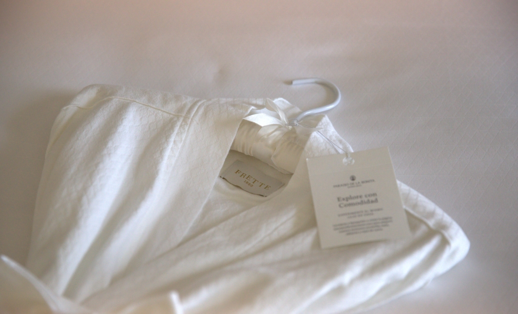 a white robe with a swinger