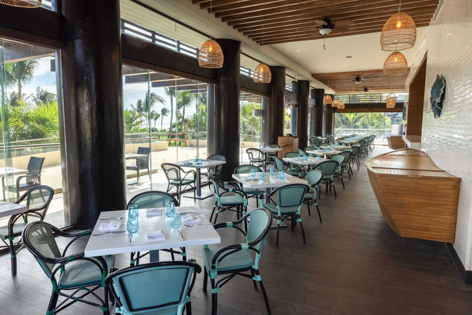 a restaurant with tables and chairs
