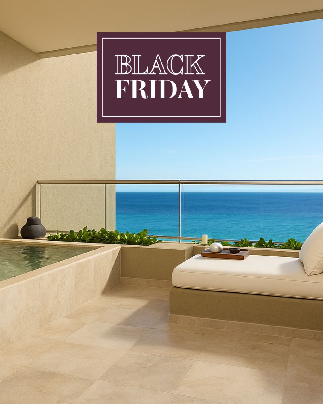 a lounge chair on a balcony overlooking the ocean