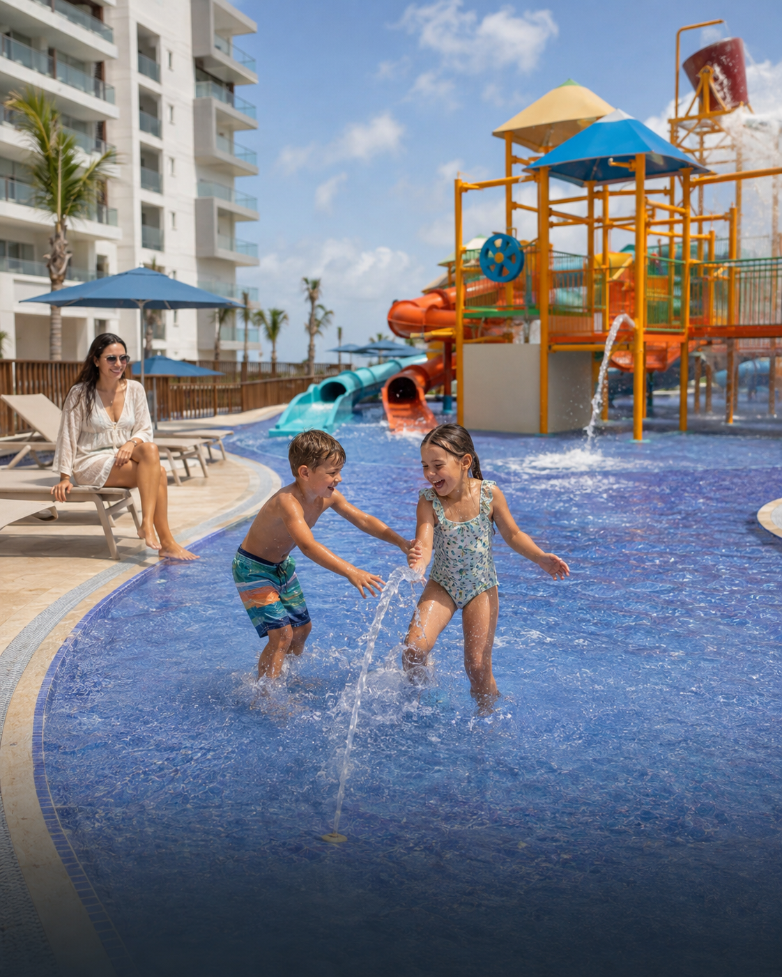 a group of kids playing in a pool