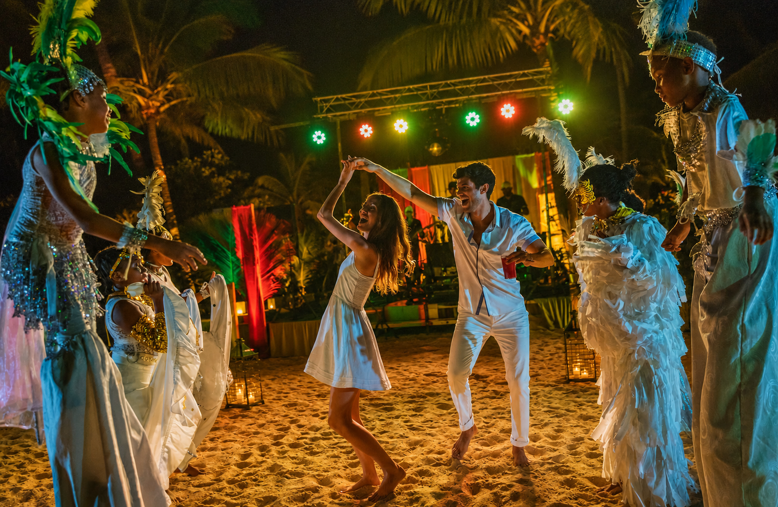 Adults dancing during a beach celebration in Jamaica