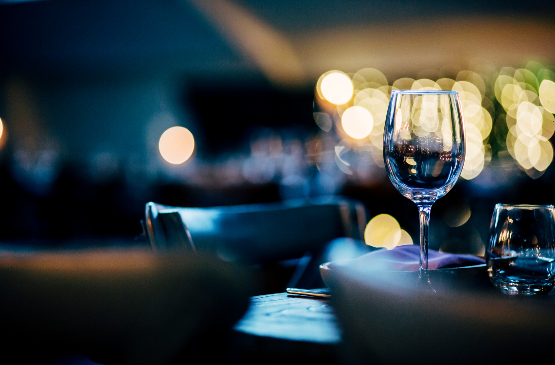 a wine glass on a table