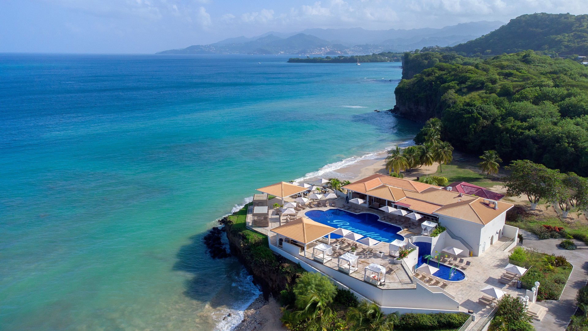 a swimming pool on a beach