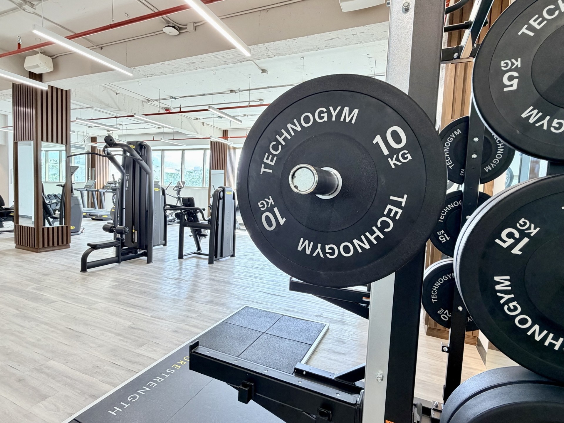 a gym with weights and equipment