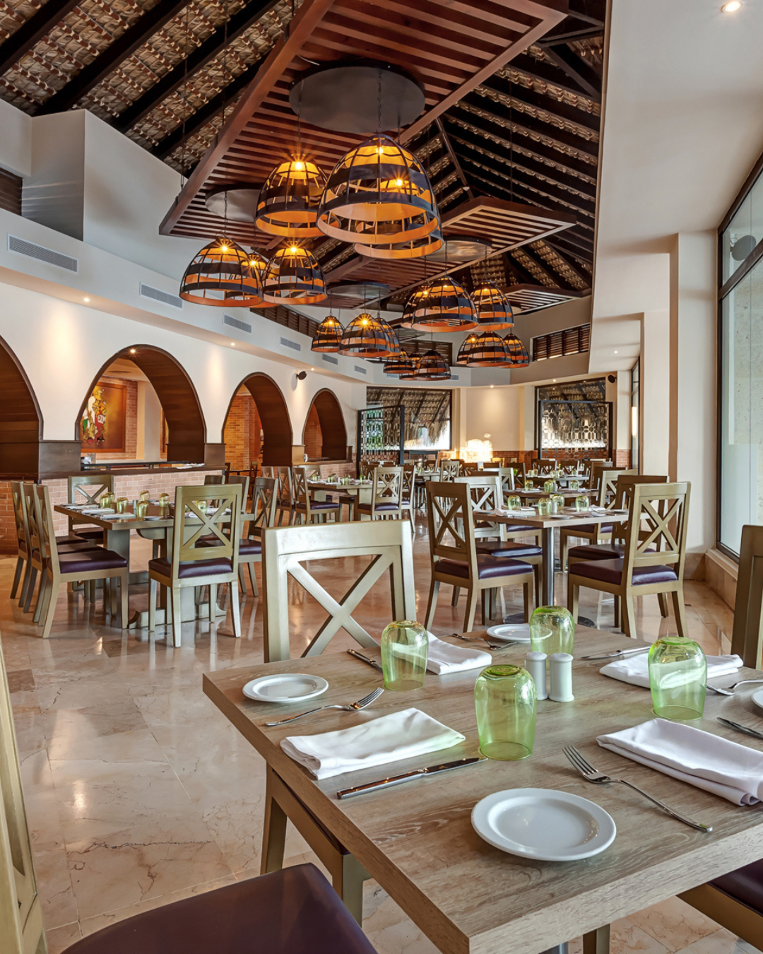 a restaurant with tables and chairs