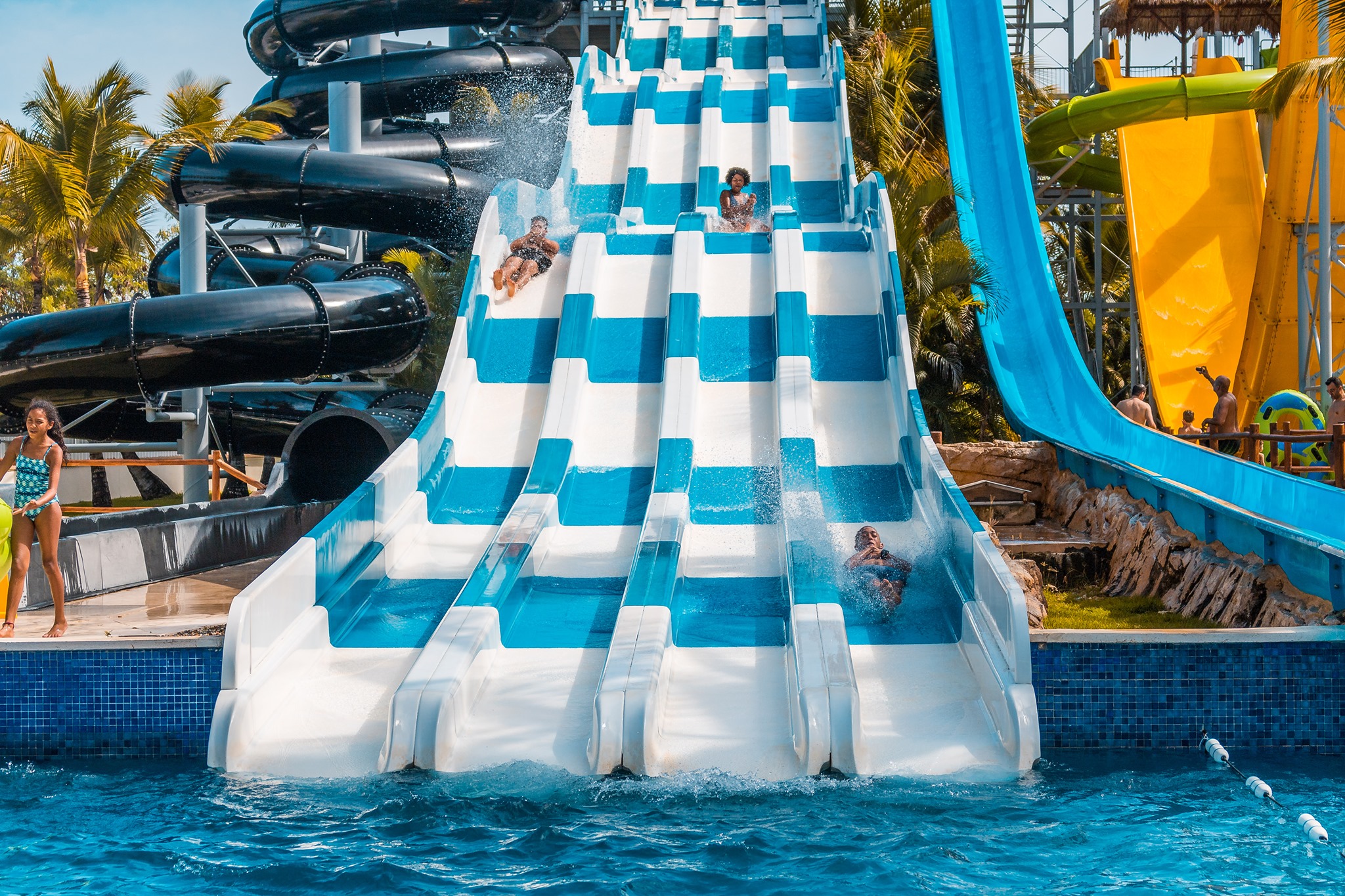 people on a water slide